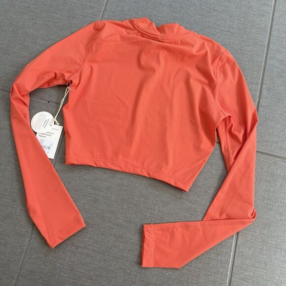 VUORI Dune Crop Swim Top Size XS Grapefruit Orange NEW Long Sleeve Rash Guard - Picture 7 of 10